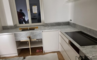 Küche in Bonn mit Marmor Arbeitsplatten und Rückwände Bianco Carrara C