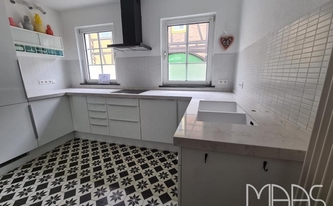 Montage der Silestone Arbeitsplatten und Wischleisten Lagoon in Bonn