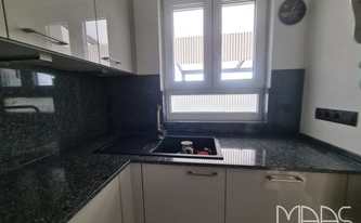 Granit Arbeitsplatten und Rückwände Negro Tulipa in Bornheim montiert