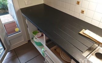 Granit Arbeitsplatten Nero Assoluto Zimbabwe in Erftstadt montiert