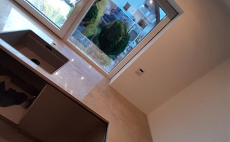 Küche in Gelnhausen mit Dekton Arbeitsplatten und Rückwände Arga