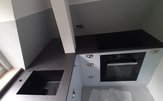 Küche in Hamburg mit Dekton Arbeitsplatten Fossil
