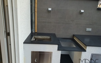 Außenküche in Köln mit Granit Arbeitsplatten Nero Assoluto India