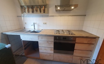 Küchenzeile in Köln mit Granit Arbeitsplatte Astoria Ivory