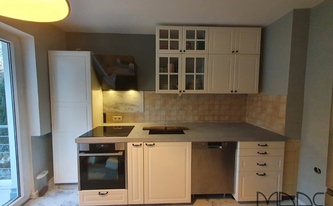 Küchenzeile in Köln mit Laminam Arbeitsplatte Cemento Cenere Ctx
