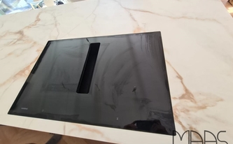 Porcelanosa Arbeitsplatte Calacatta Gold mit Ceranfeld