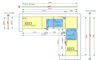 L-förmige Küche mit Granit Arbeitsplatten und Wischleisten