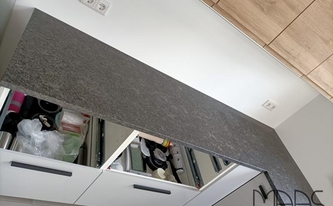 U-Küche mit drei Granit Arbeitsplatten Steel Grey