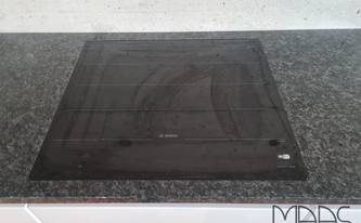 Granit Arbeitsplatte Nero Lugana mit Ceranfeld