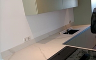 Küche in Bad Homburg der Calacatta Oro Venato Laminam Arbeitsplatten und Wischleisten