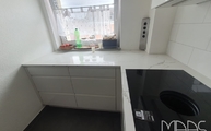 Montage in Köln der 8868 Argos White CTX-BasicQuarz Arbeitsplatten und Wischleisten