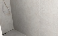 Dusche mit Bottega Acero großformatigen Porcelanosa Fliesen 