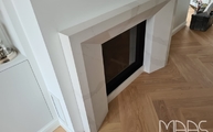 Montage der Silestone Kaminabdeckplatten Eternal Calacatta Gold in Köln