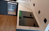 Montage der Extra Statuario Infinity Arbeitsplatten in Köln