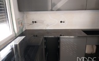 L-förmige Küchenzeile in Köln mit Nero Assoluto India Granit Arbeitsplatten