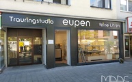 Kölner Geschäft mit Level Keramik Fassadenplatten Raku Nero verkleidet
