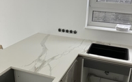 Marmoroptik der Calacatta Oro Infinity Arbeitsplatten
