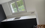 Küchenzeile mit Neural Dekton Arbeitsplatte und Rückwand