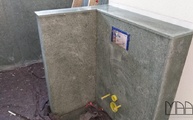 Spülkastenverkleidung mit Granitplatten Andeer