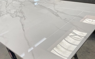 Lieferung in Rheinbach der Level Keramik Tischplatte Statuario Michelangelo