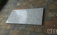 Lieferung der Granitplatte aus dem Material Bianco Sardo in Schwäbisch Hall